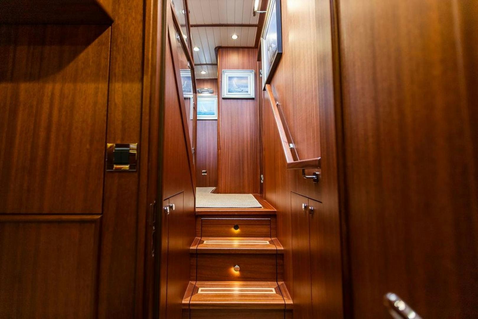 a wooden cabinet with drawers aboard JESSICA Yacht for Sale
