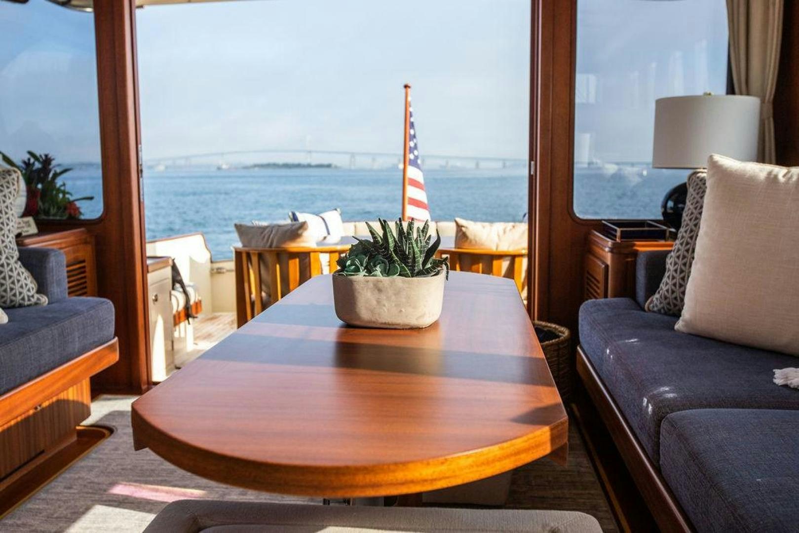 a table with a plant on it aboard JESSICA Yacht for Sale