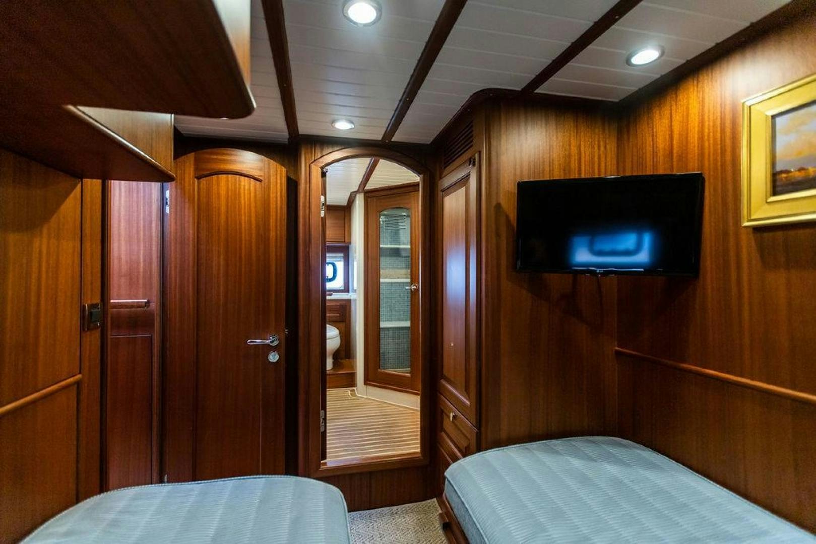 a bed in a room aboard JESSICA Yacht for Sale