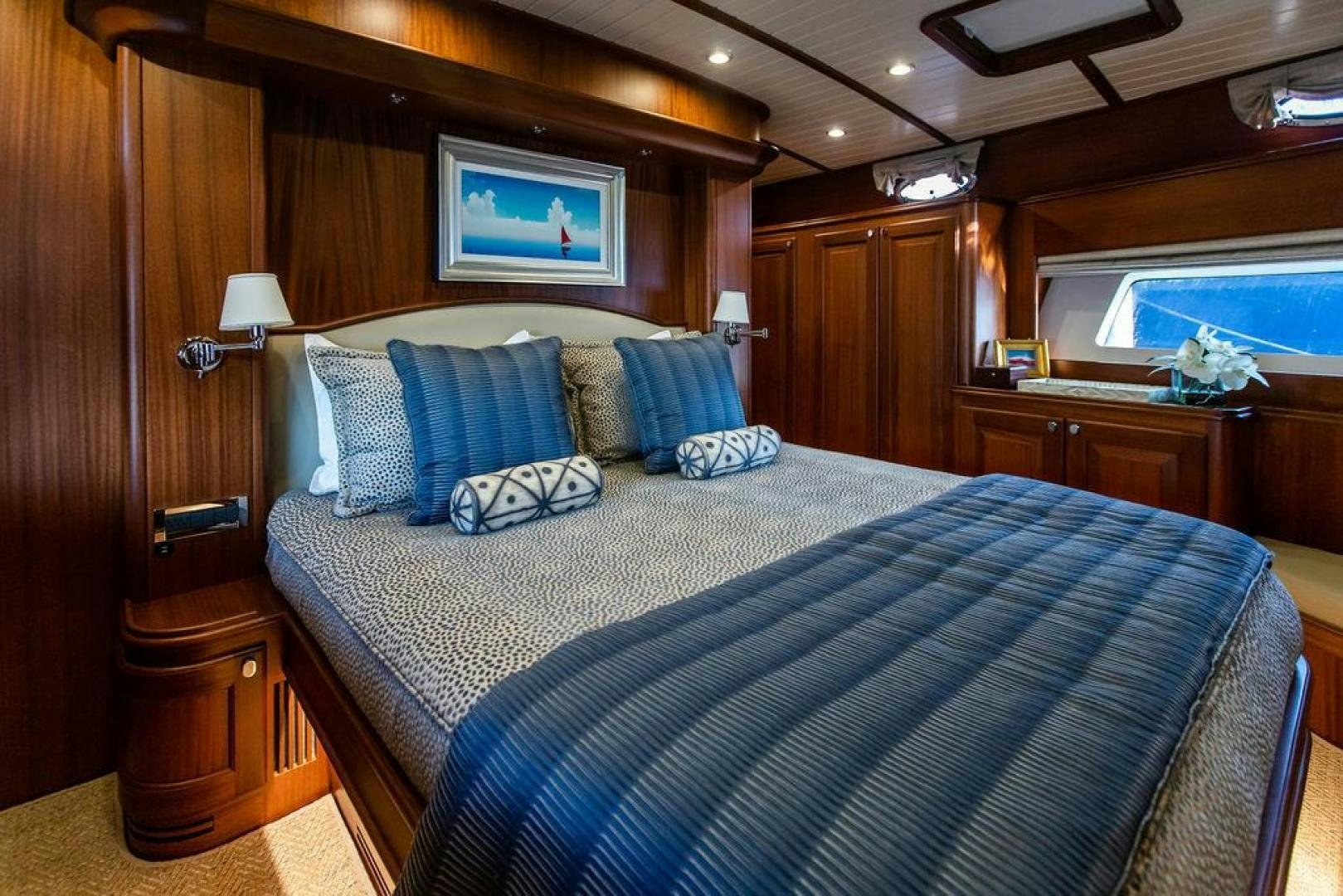 a bed in a room aboard JESSICA Yacht for Sale