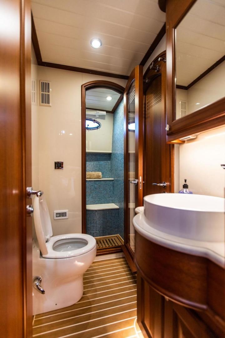 a bathroom with a sink toilet and bathtub aboard JESSICA Yacht for Sale