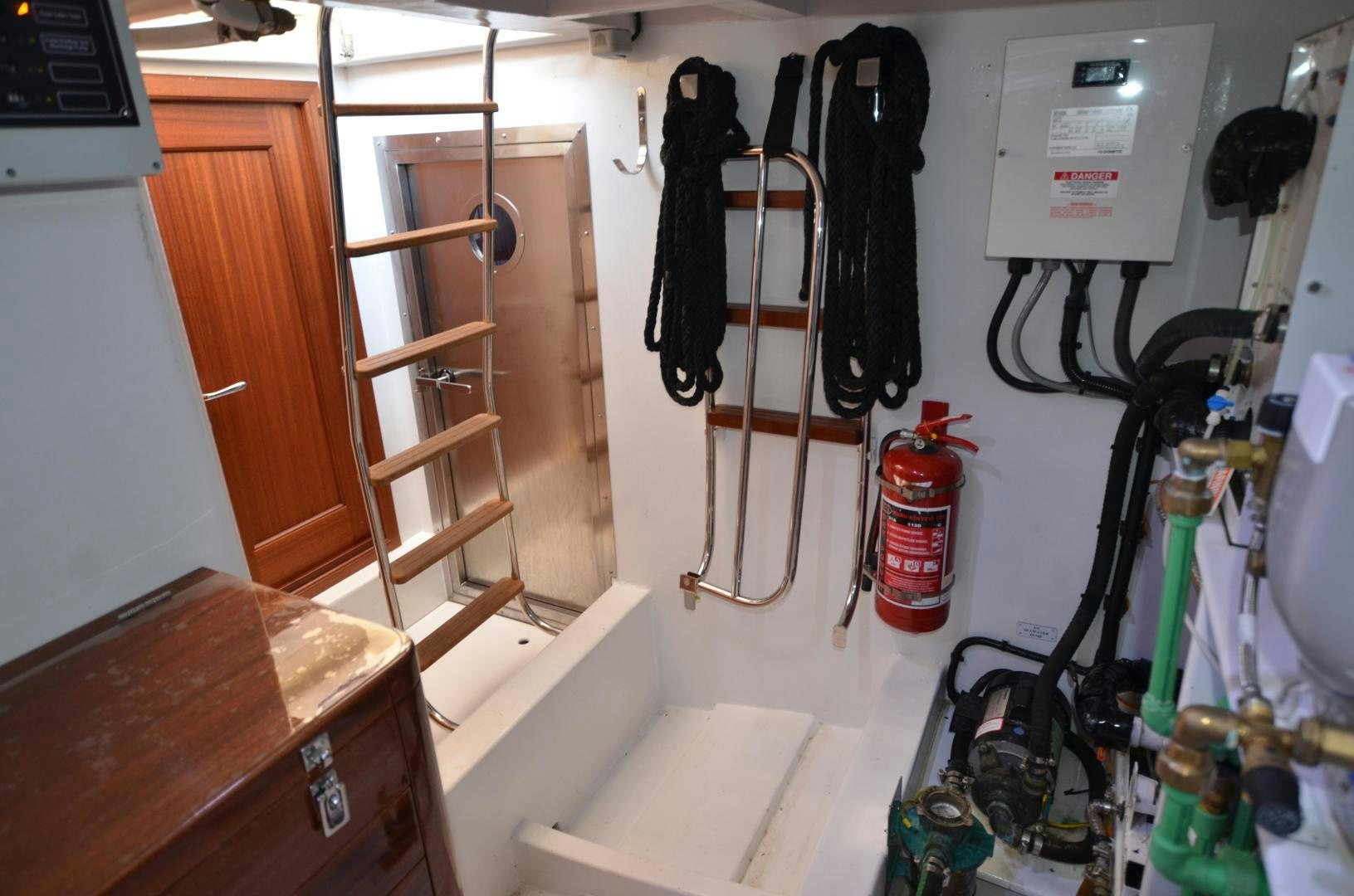 a room with a ladder and a sink aboard JESSICA Yacht for Sale