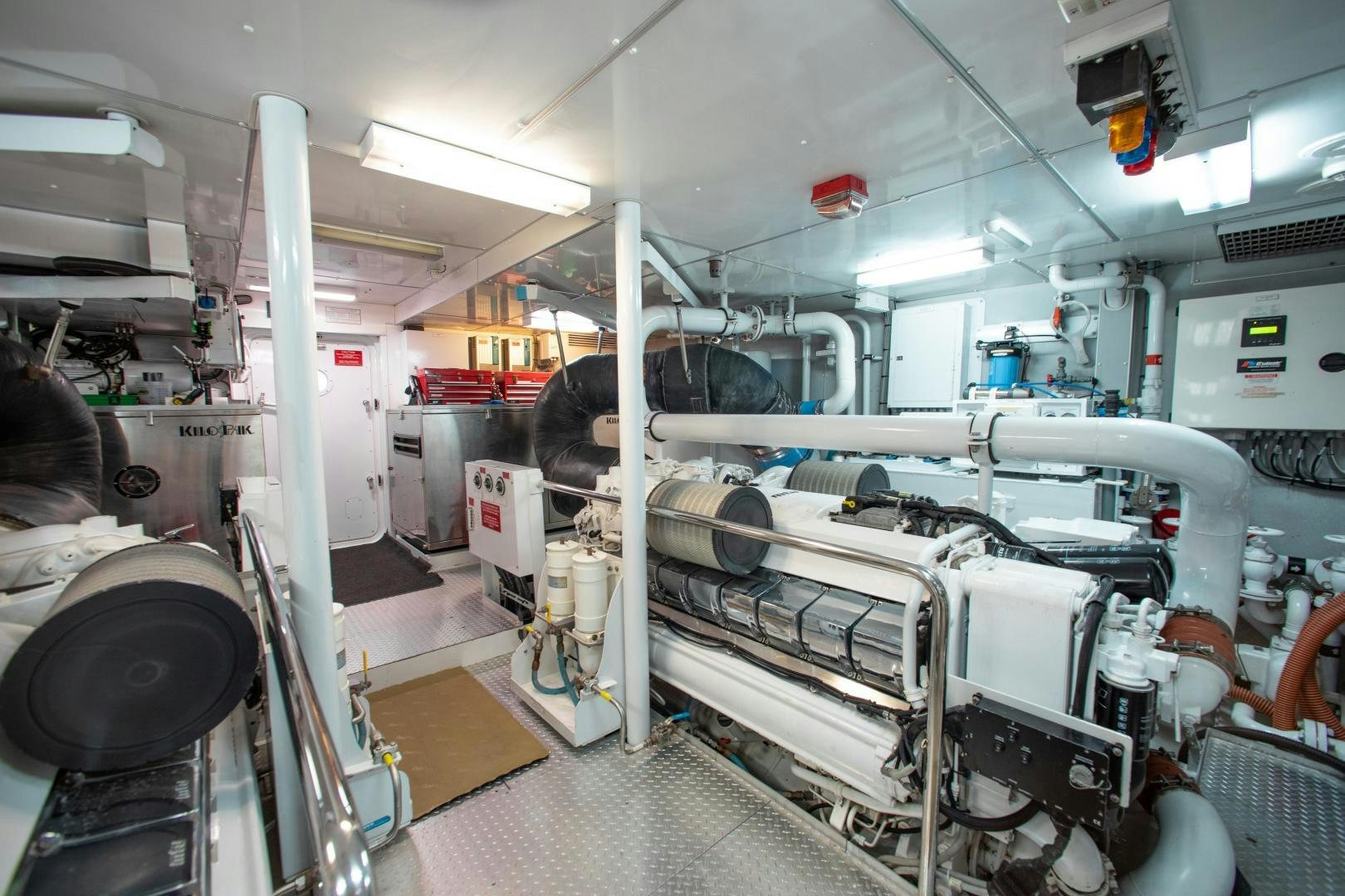 a room with machines and equipment aboard BLACKSHEEP Yacht for Sale