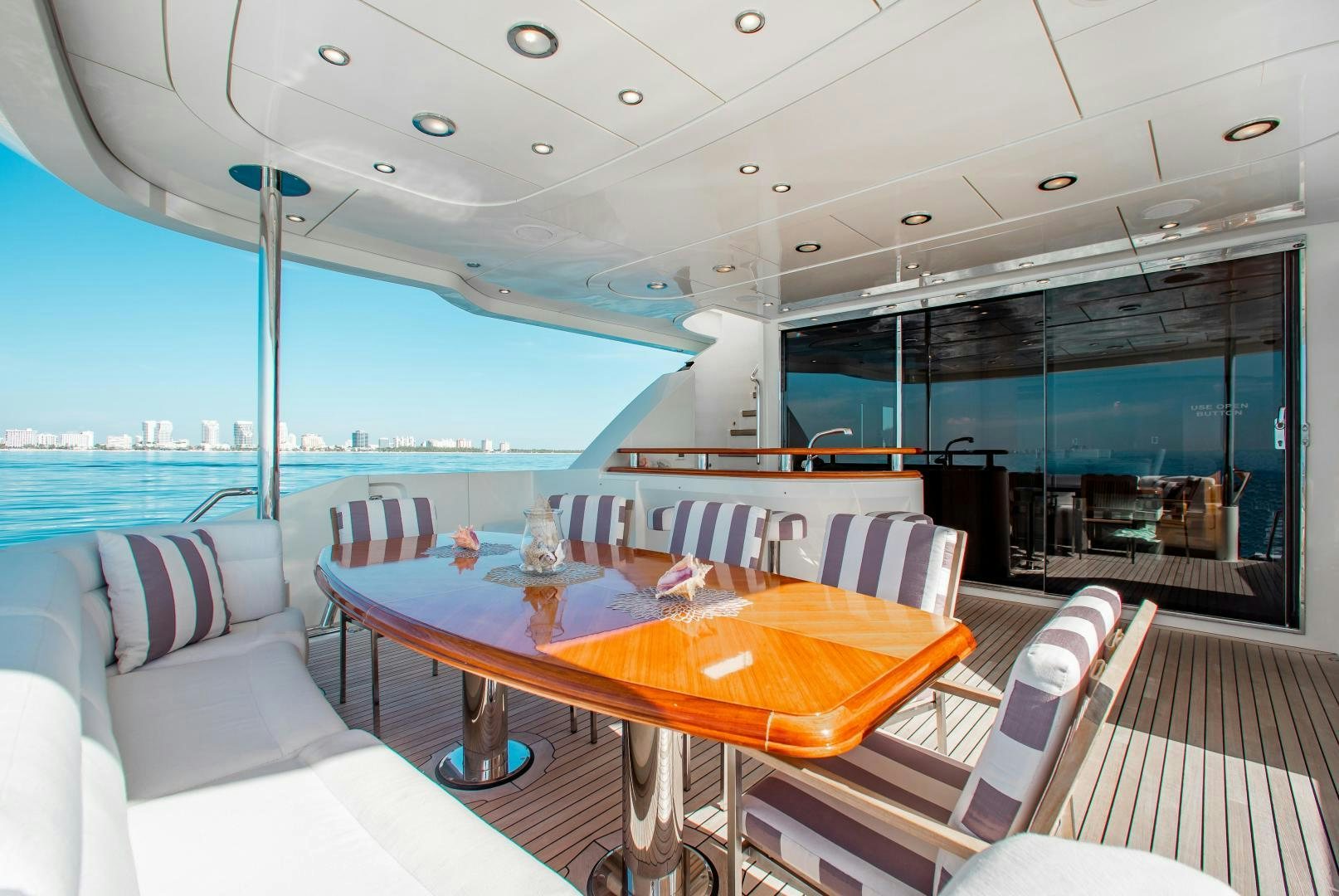 a table and chairs on a boat aboard BLACKSHEEP Yacht for Sale