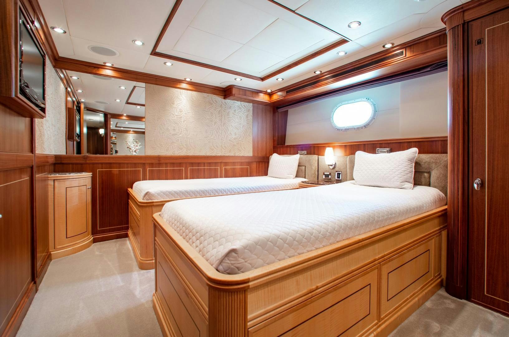 a bed in a room aboard BLACKSHEEP Yacht for Sale