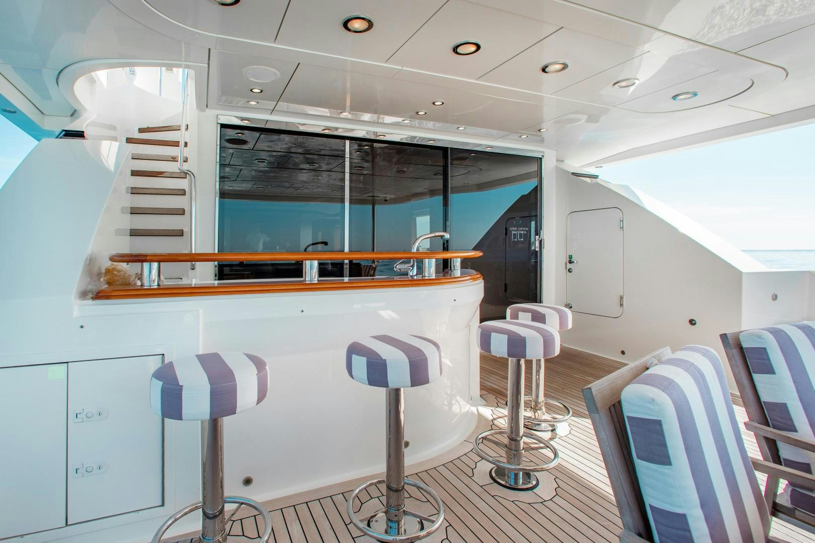a piano in a room aboard BLACKSHEEP Yacht for Sale