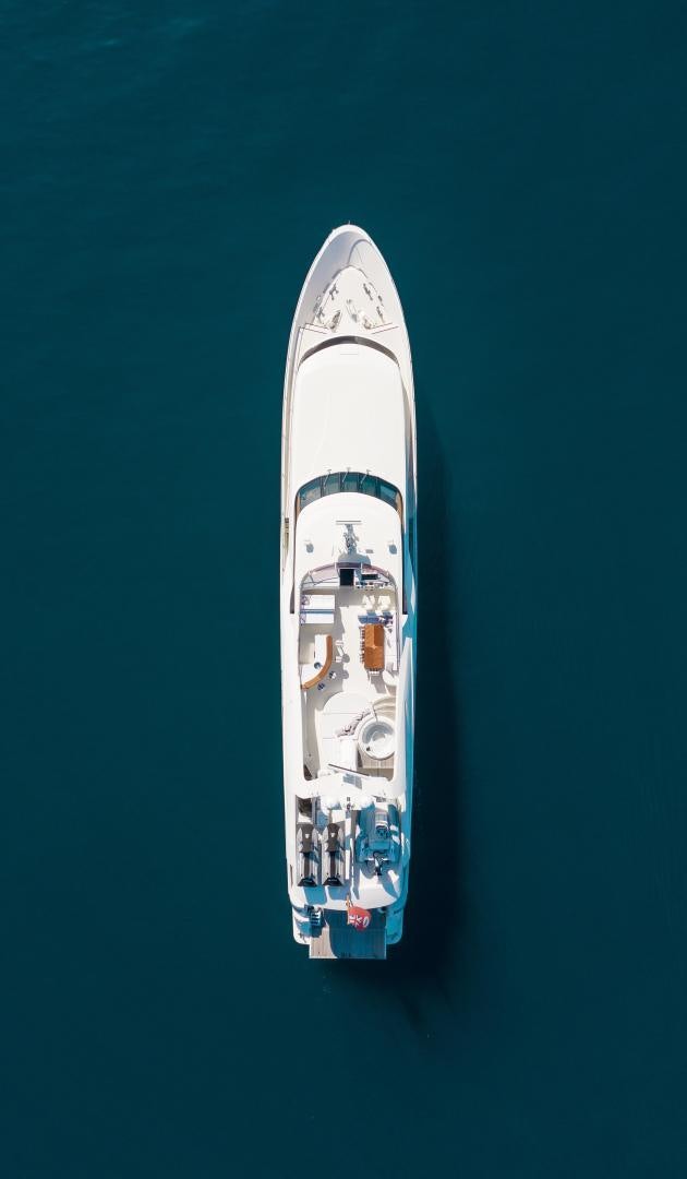 a white rocket on a blue surface aboard BLACKSHEEP Yacht for Sale
