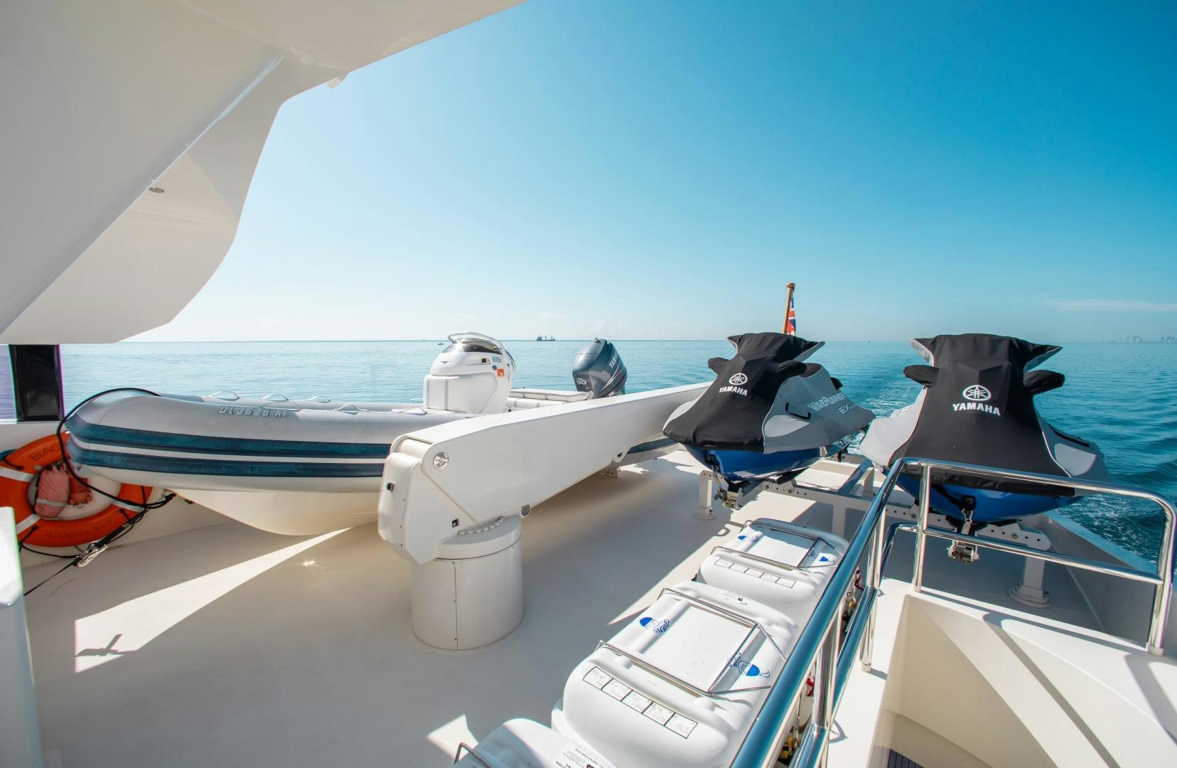 a boat with a couple of boats on it aboard BLACKSHEEP Yacht for Sale