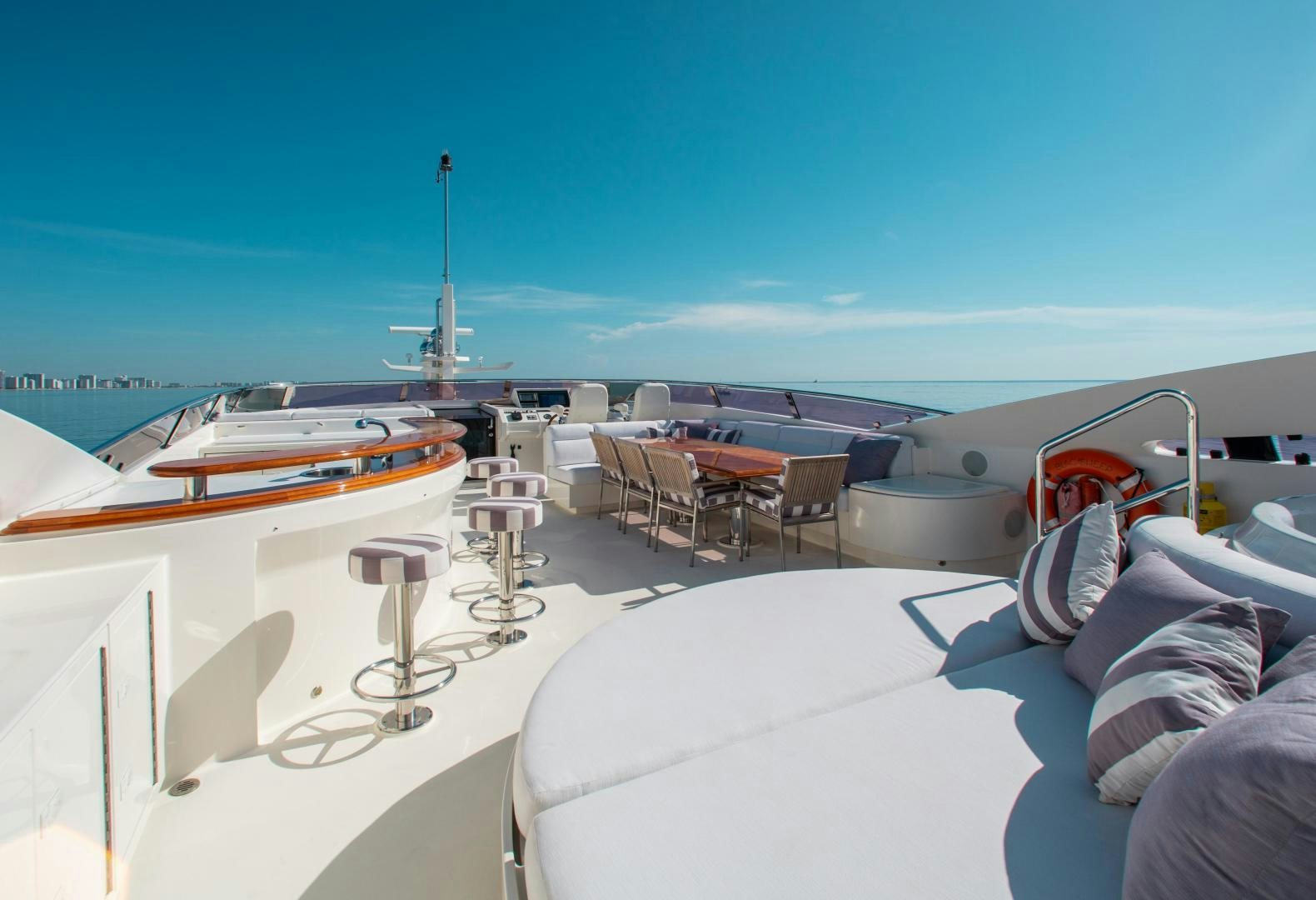 a large white boat in a large body of water aboard BLACKSHEEP Yacht for Sale