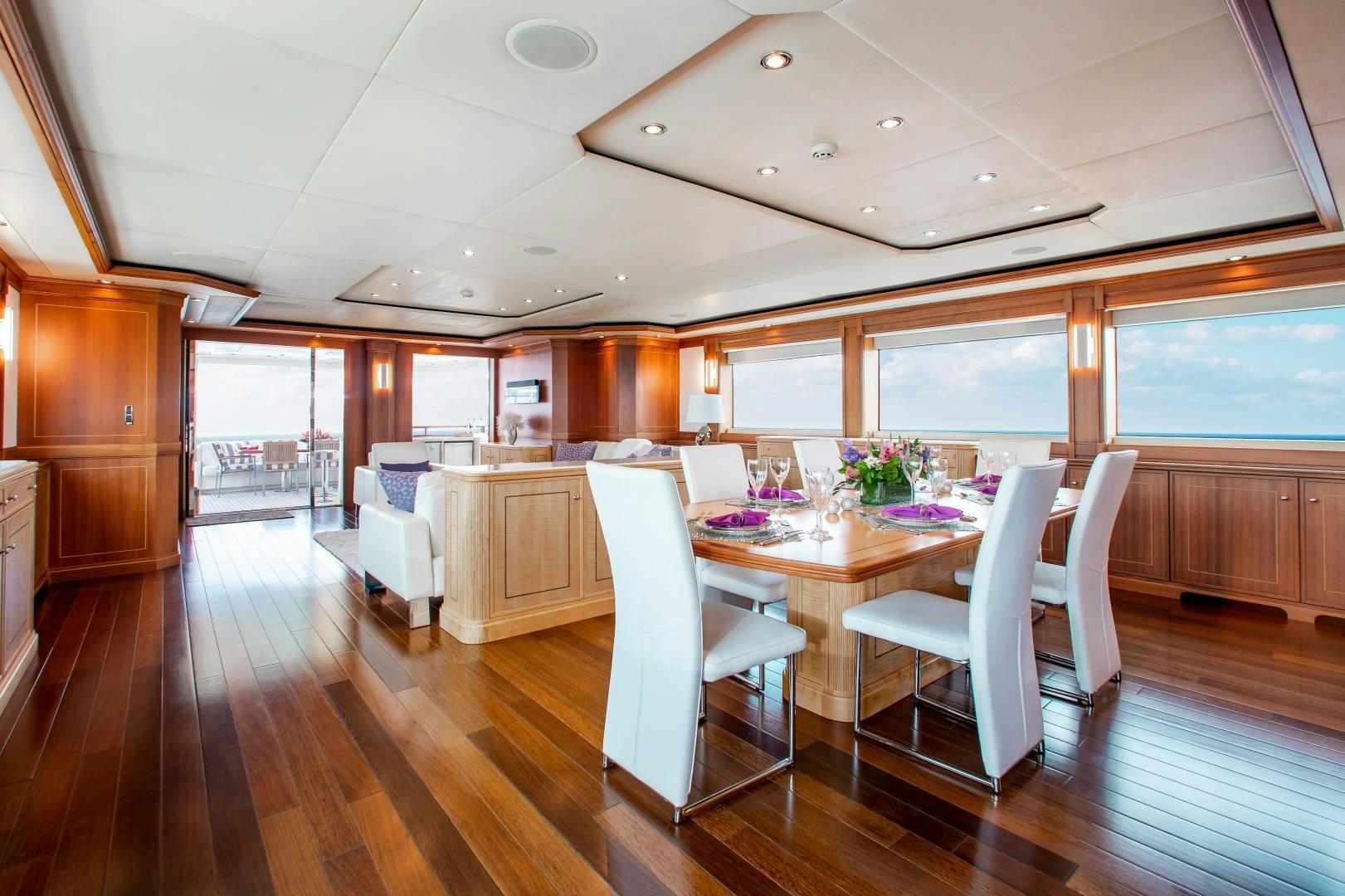 a large kitchen with a dining table aboard BLACKSHEEP Yacht for Sale