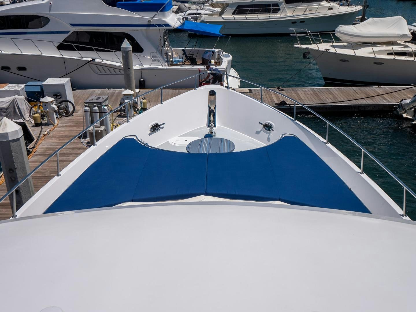 a boat docked at a pier aboard LONE WOLF Yacht for Sale