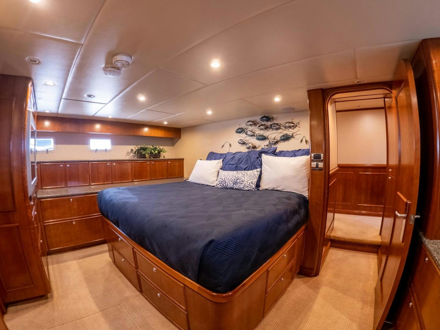 a bedroom with a large bed aboard LONE WOLF Yacht for Sale