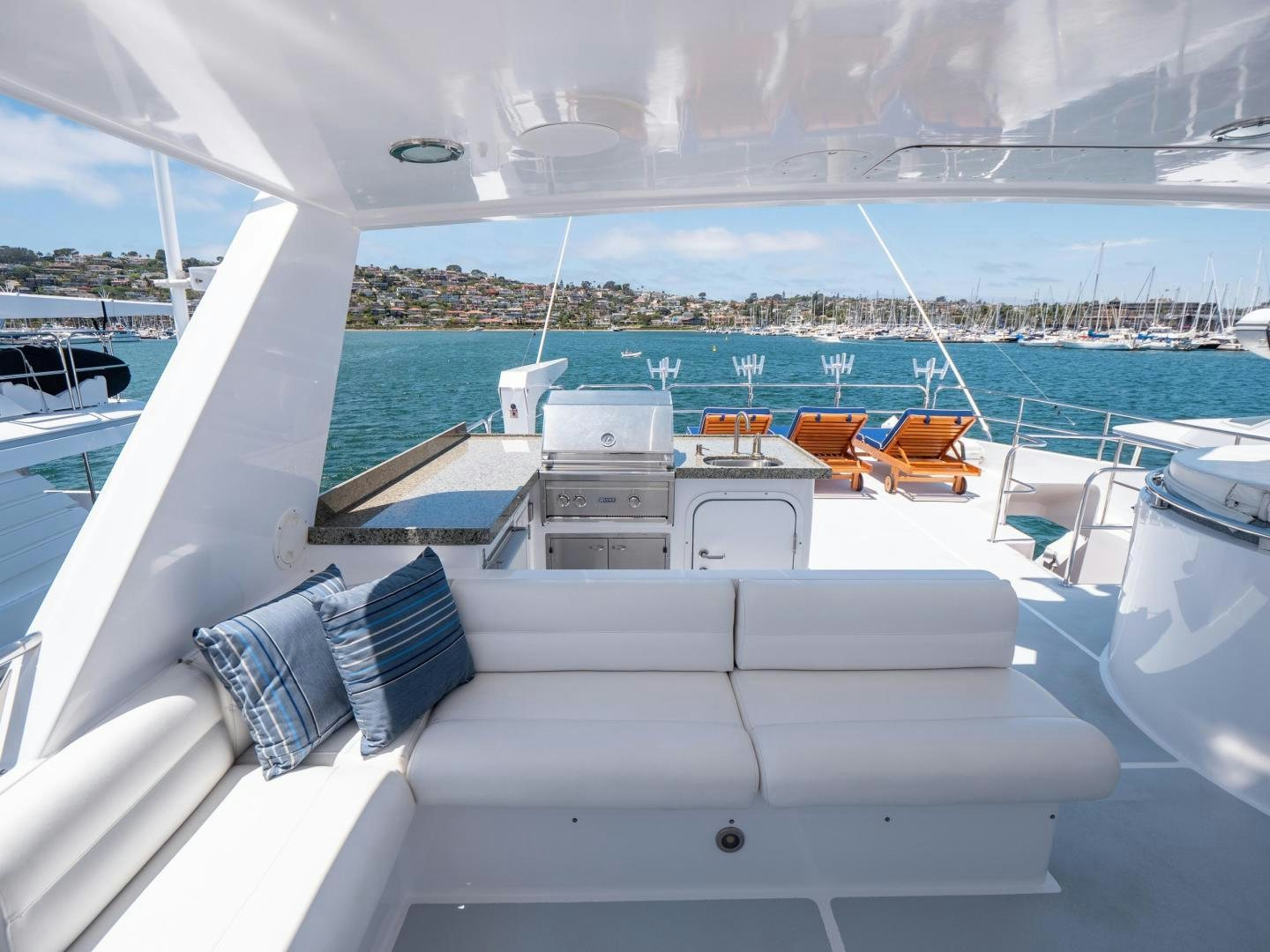 a lounge chair on a boat aboard LONE WOLF Yacht for Sale