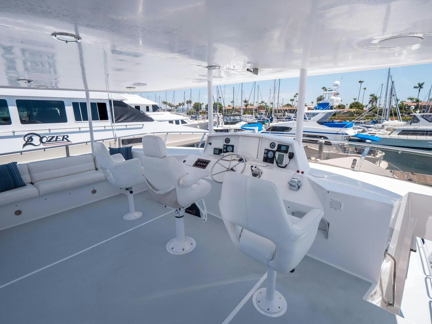 a white boat in a large room aboard LONE WOLF Yacht for Sale
