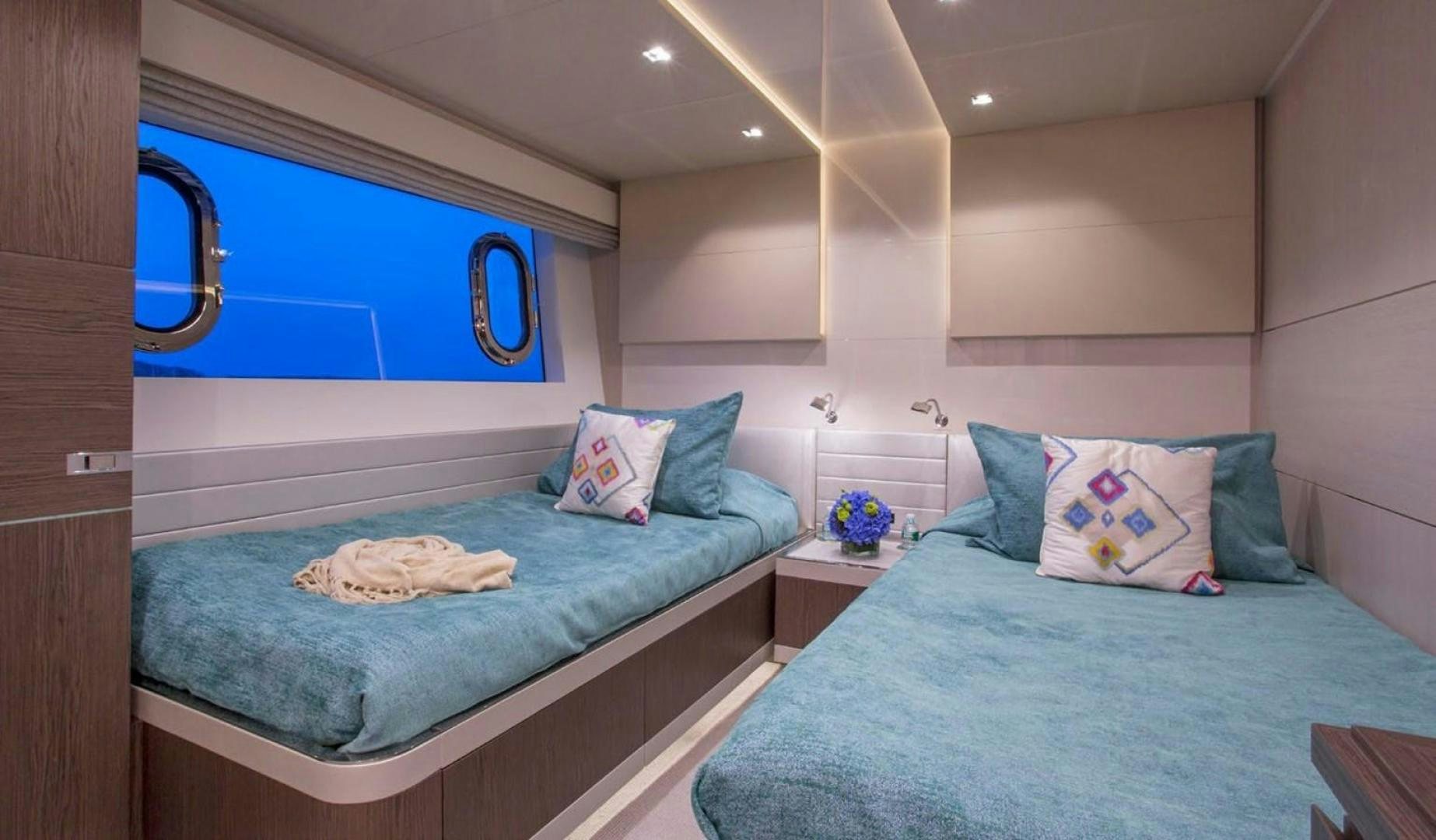 a couple of beds in a room aboard ALANDREA Yacht for Sale