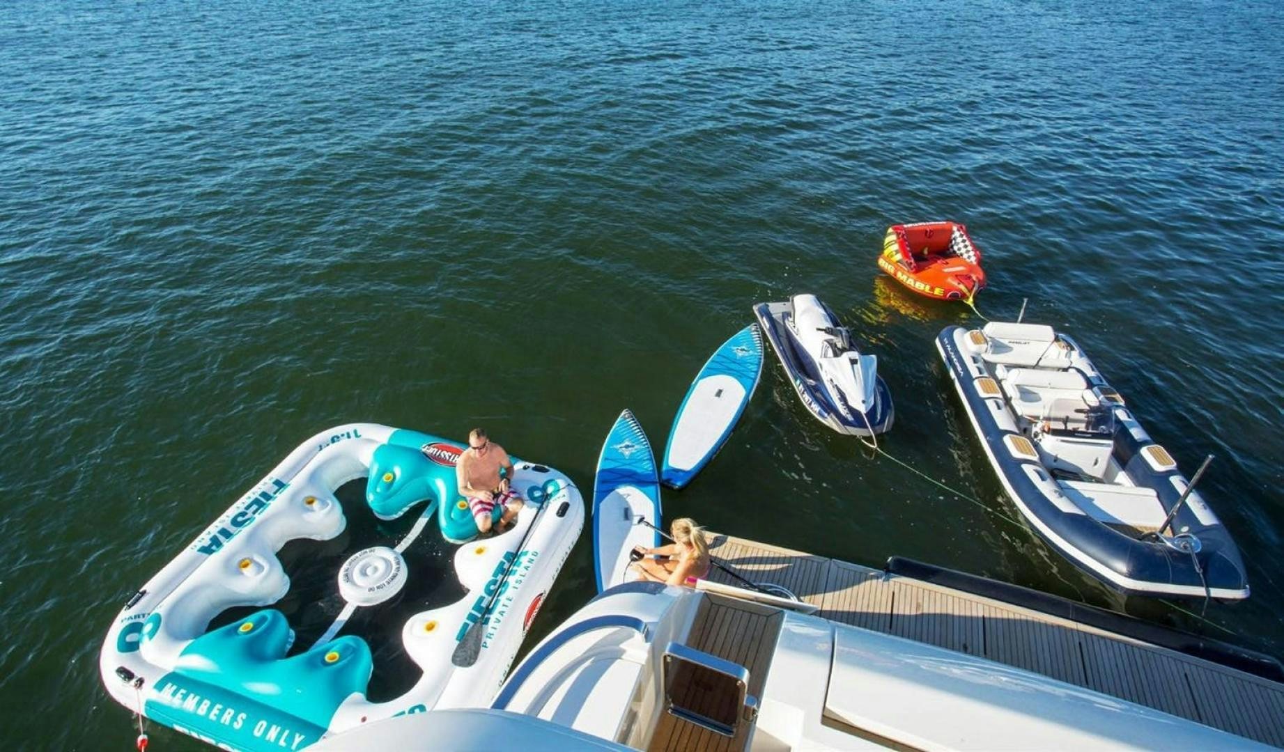 a man and a woman on a boat in the water aboard ALANDREA Yacht for Sale