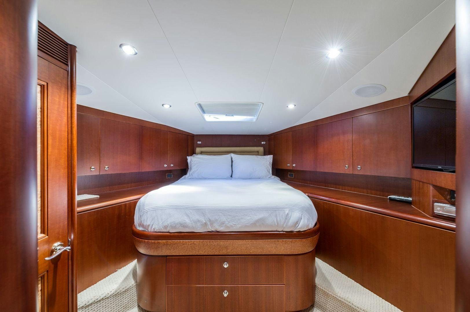 a bed in a room aboard WINDWARD Yacht for Sale