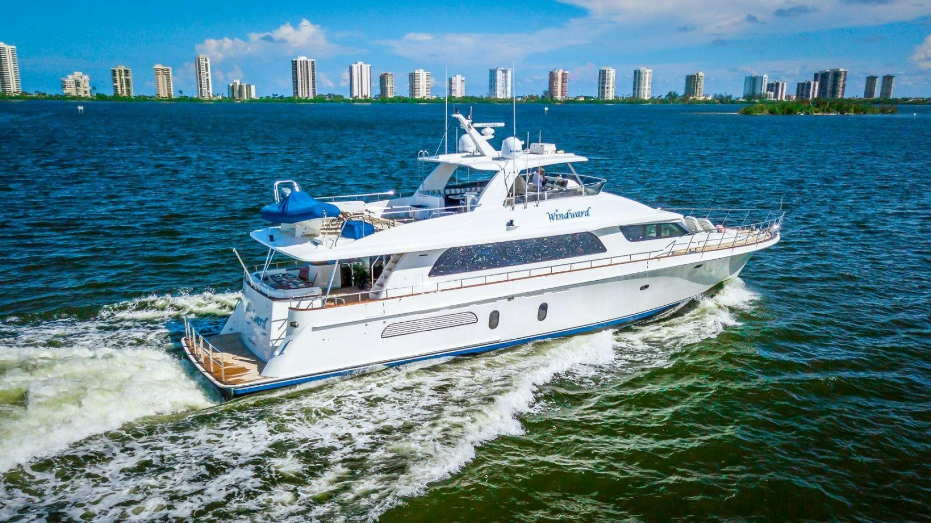 a white yacht on the water aboard WINDWARD Yacht for Sale