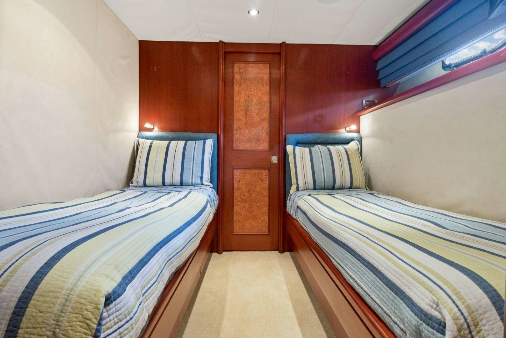 a couple of beds in a room aboard WINDWARD Yacht for Sale