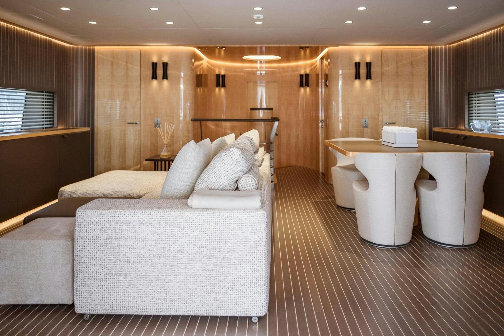 a large hotel room with a large bed and a table aboard AKAR XIII Yacht for Sale