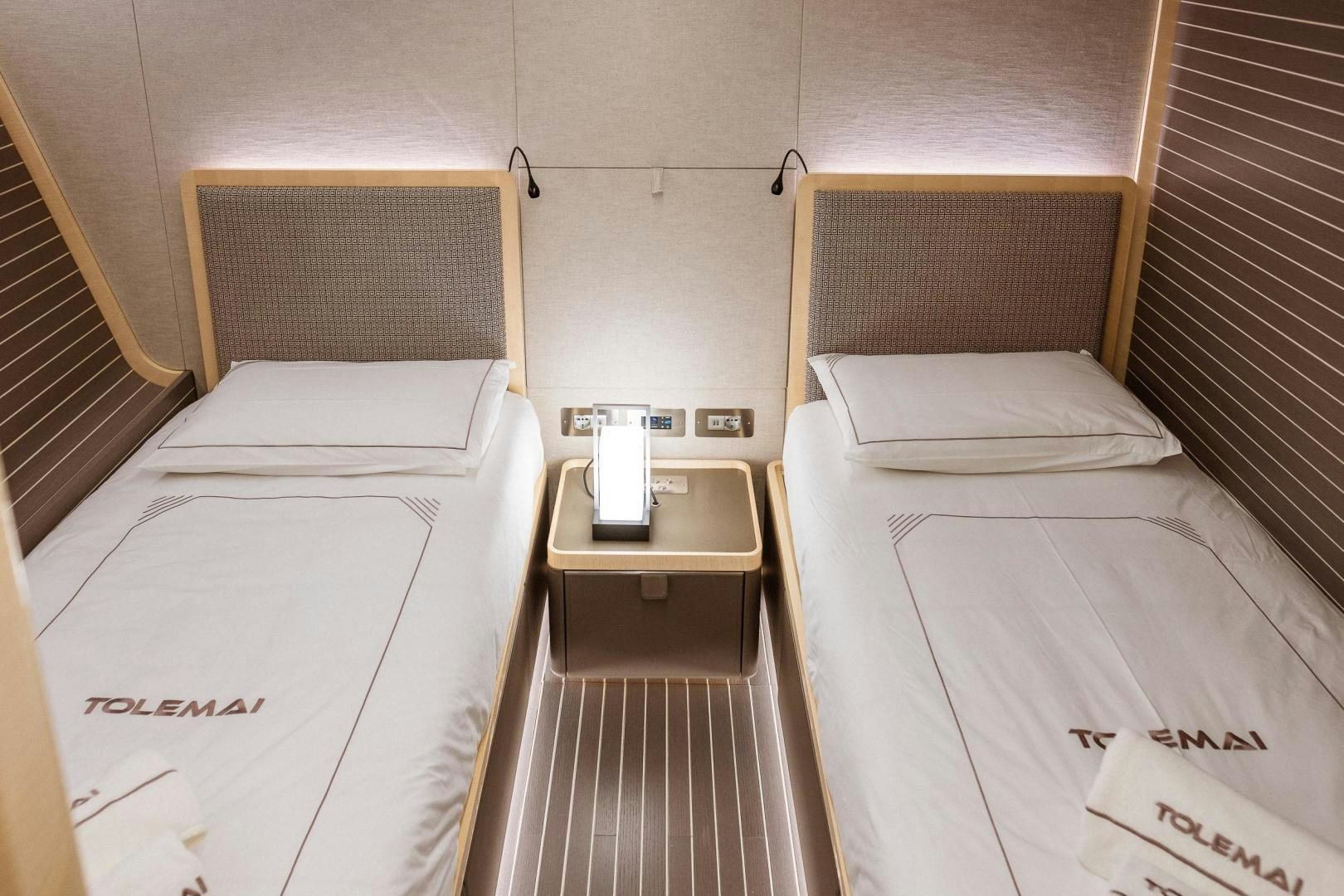 a couple of beds in a room aboard AKAR XIII Yacht for Sale
