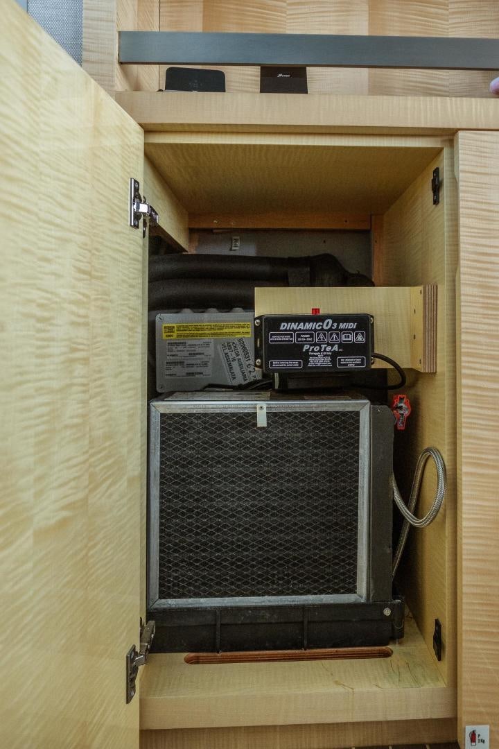 a computer tower with a box on top aboard AKAR XIII Yacht for Sale