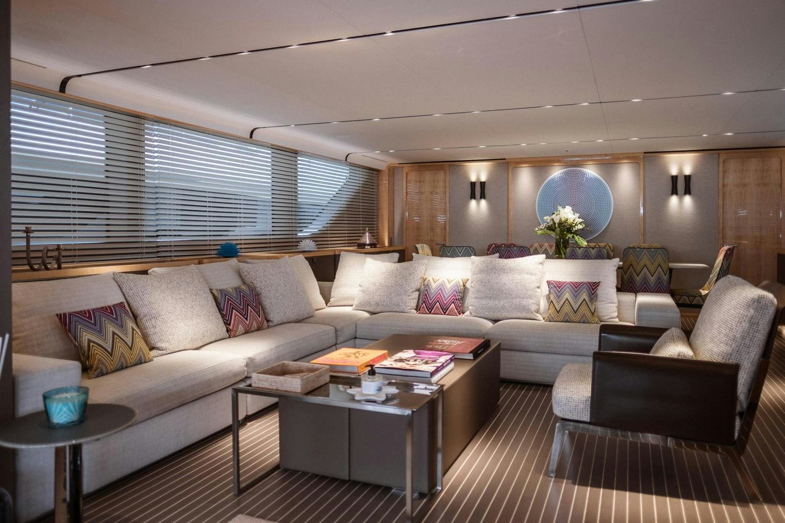 a living room with a large window aboard AKAR XIII Yacht for Sale