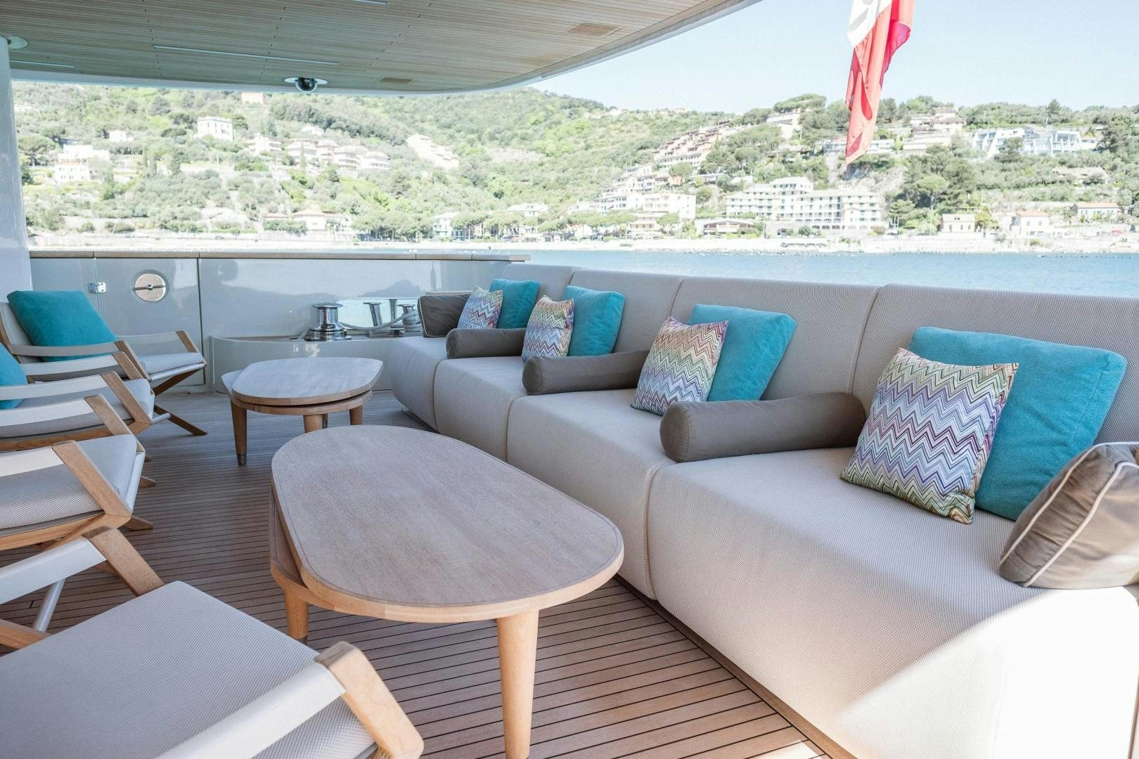 a living room with a large window aboard AKAR XIII Yacht for Sale