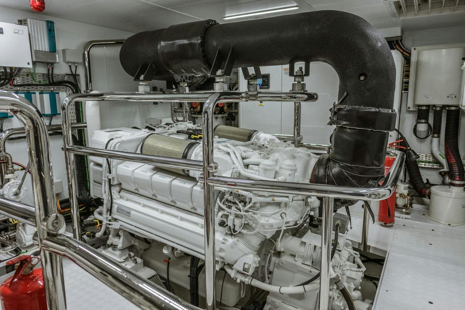 a machine with a large metal cylinder aboard AKAR XIII Yacht for Sale