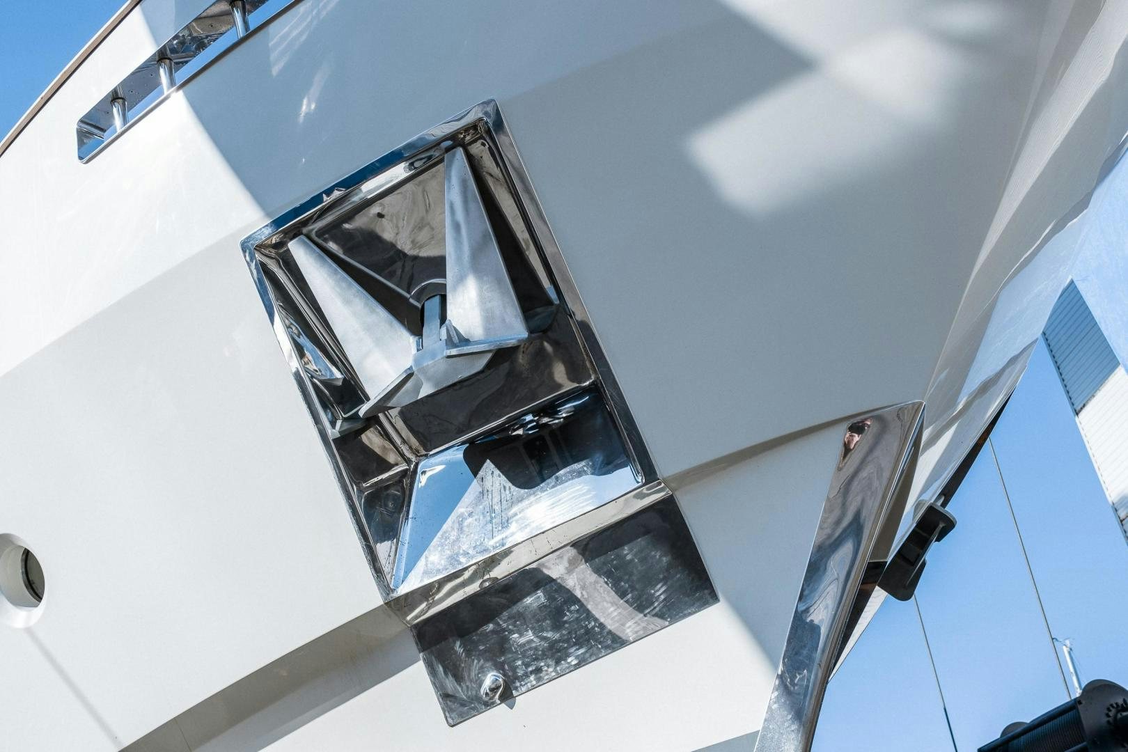 a car with a side mirror aboard AKAR XIII Yacht for Sale