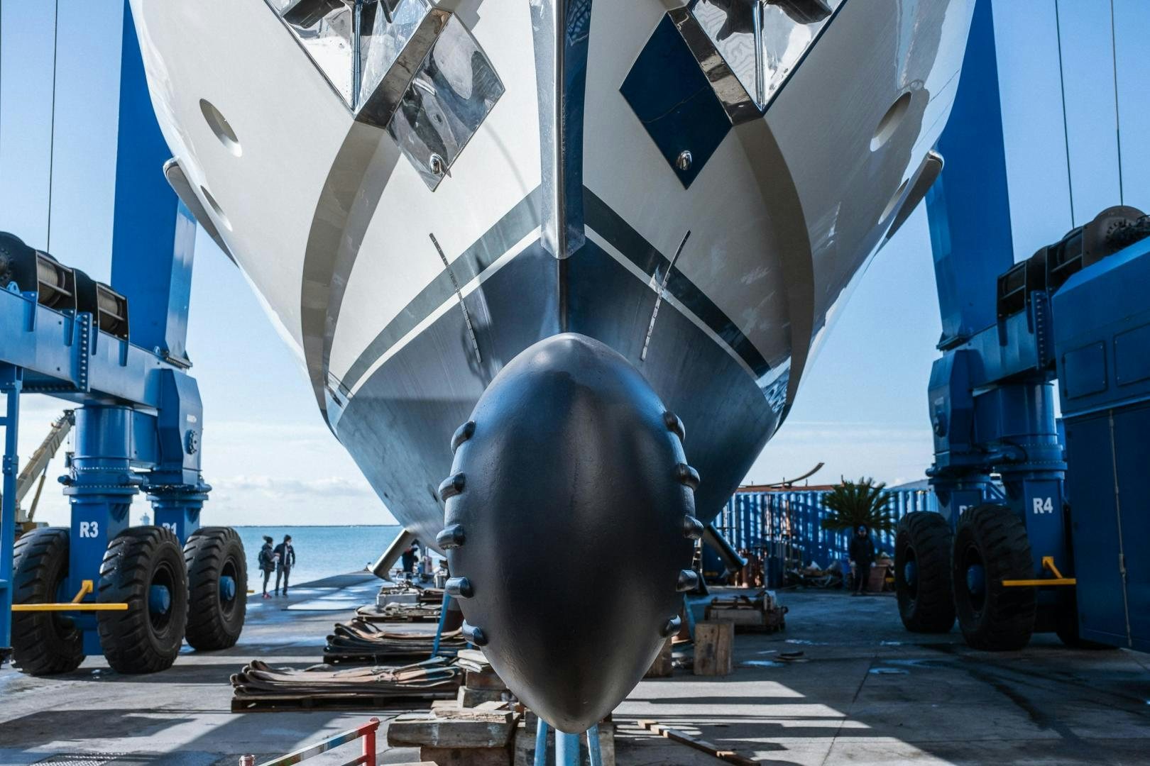 a large airplane on display aboard AKAR XIII Yacht for Sale