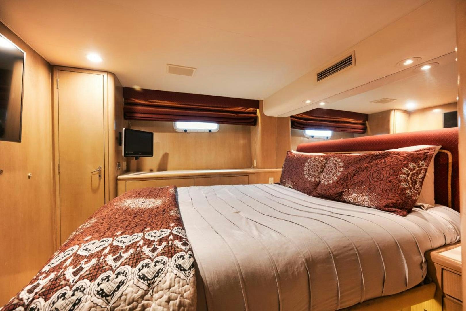 a couple of beds in a hotel room aboard HATT'S OFF Yacht for Sale