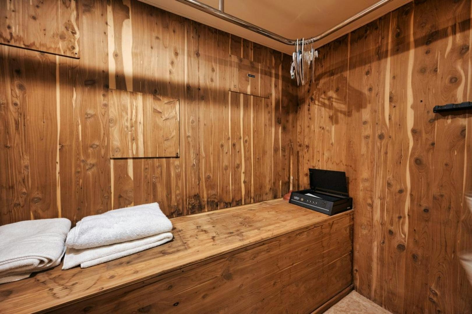 a bed in a room aboard HATT'S OFF Yacht for Sale