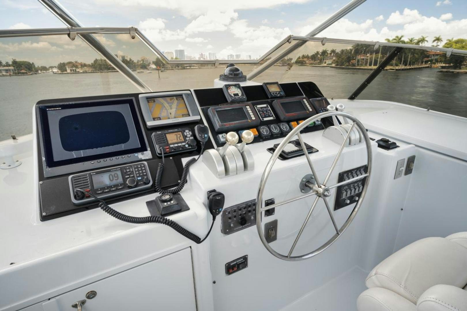 a car with a screen and a screen on the dashboard aboard HATT'S OFF Yacht for Sale