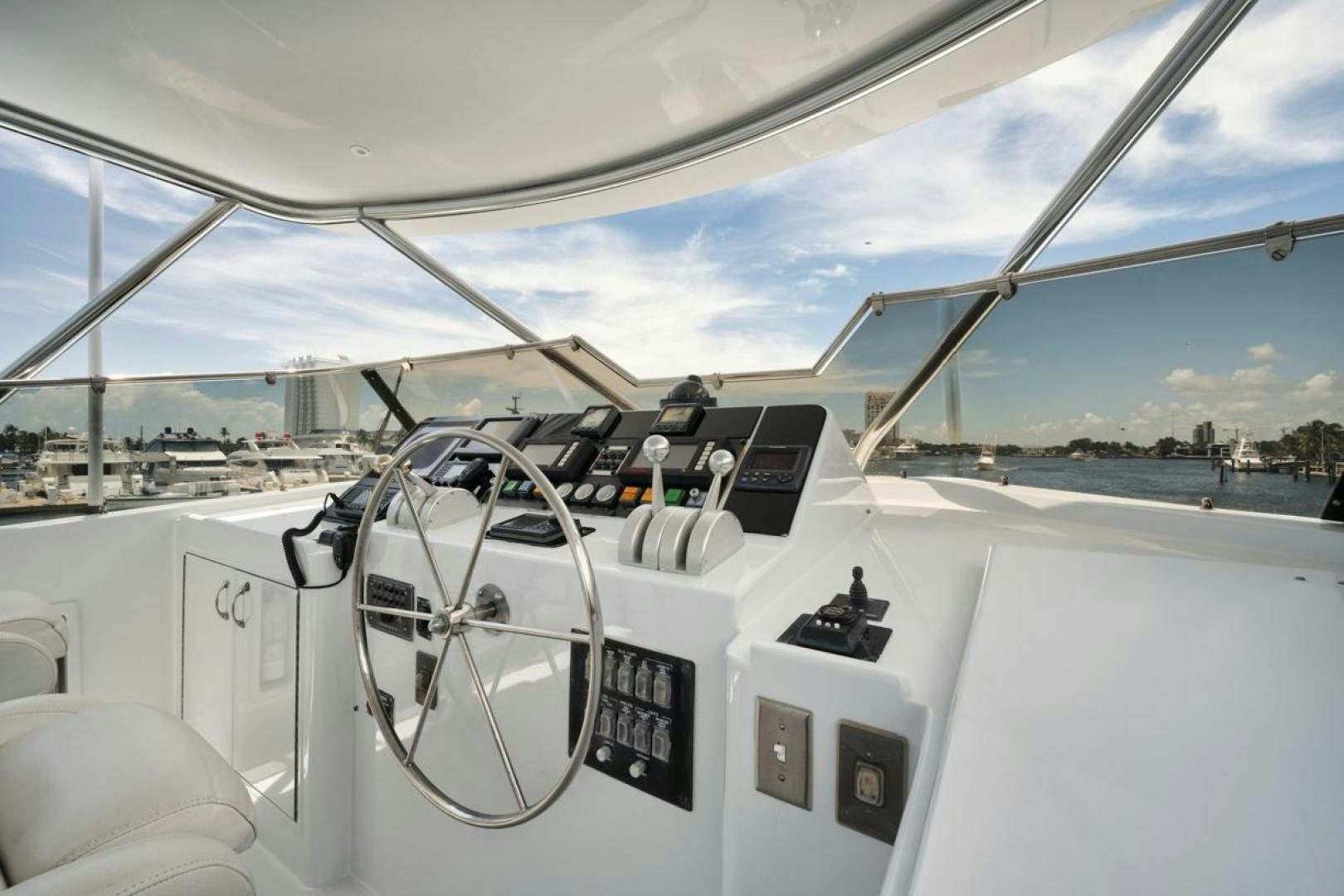 inside of a white car aboard HATT'S OFF Yacht for Sale