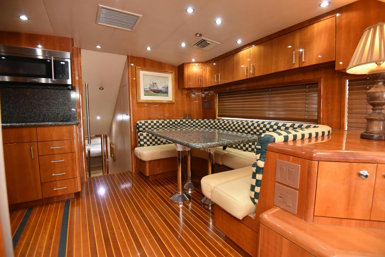 a kitchen with a bar and a bar aboard SALSA Yacht for Sale