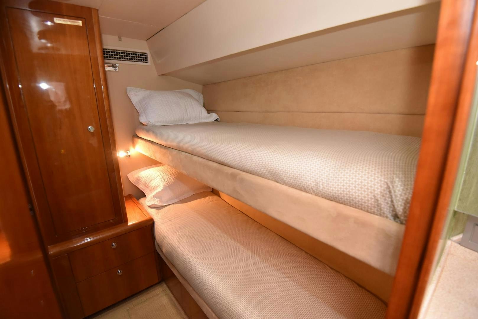a bed with a white sheet aboard SALSA Yacht for Sale