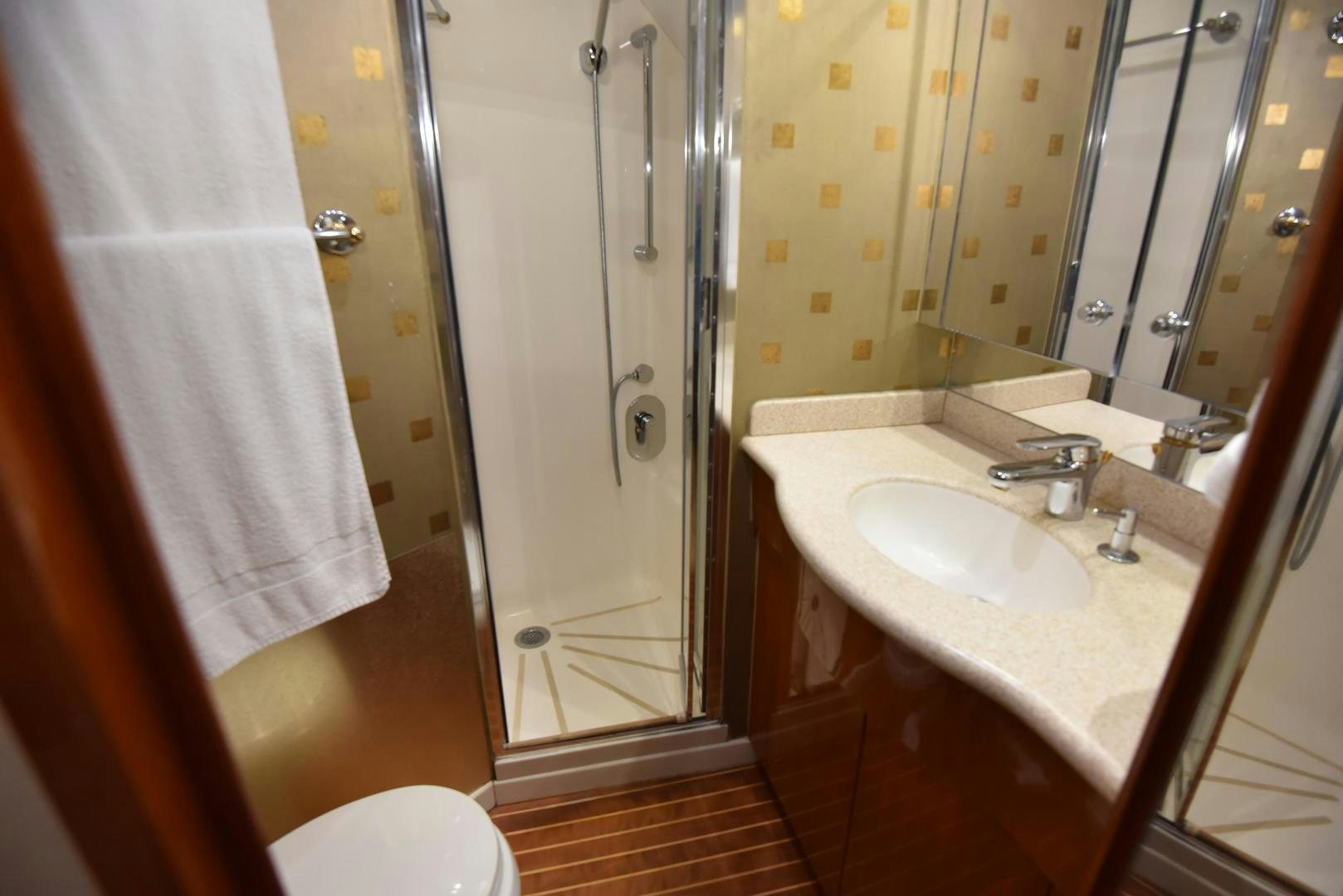 a bathroom with a sink and shower aboard SALSA Yacht for Sale