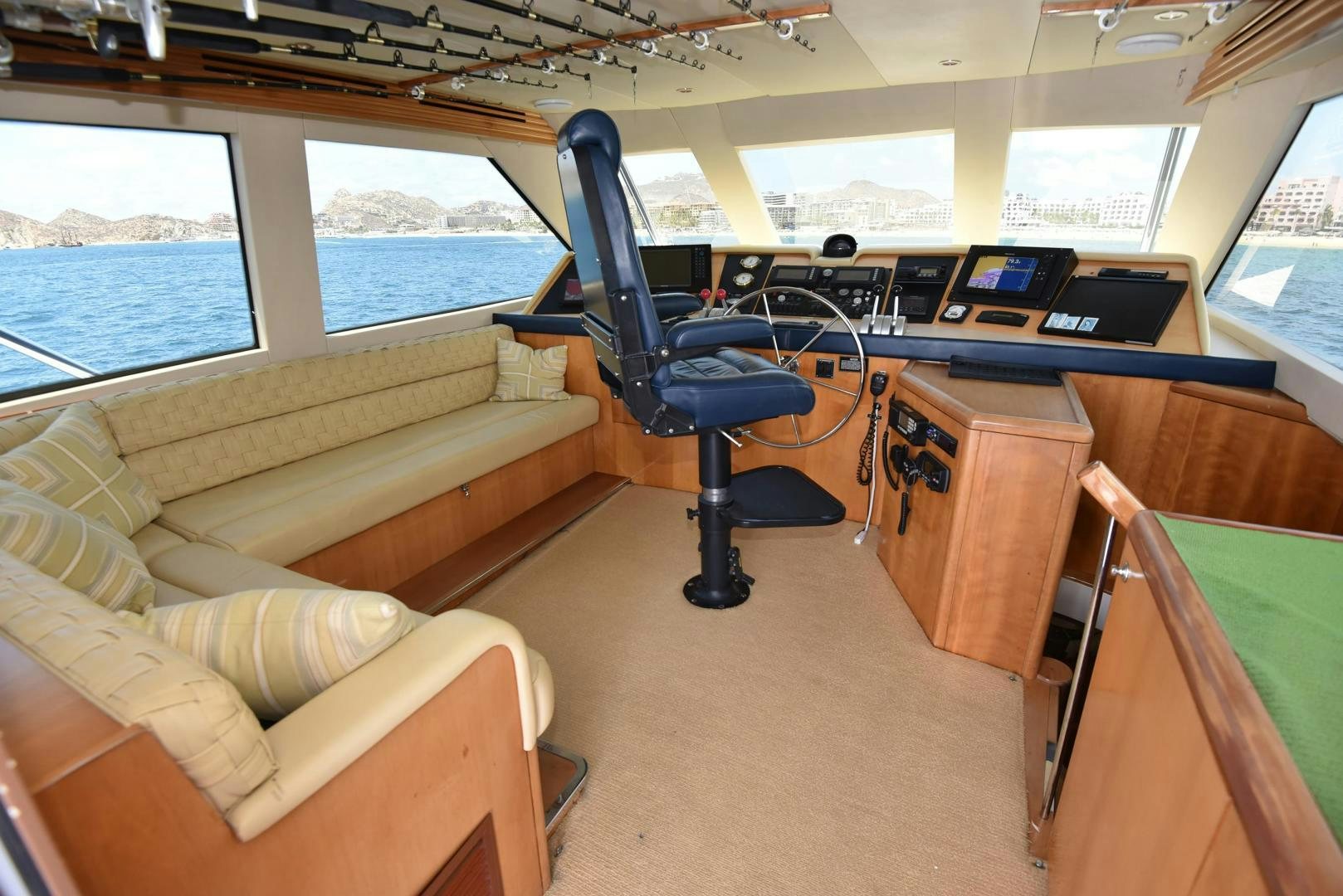 a room with a couch and a chair aboard SALSA Yacht for Sale