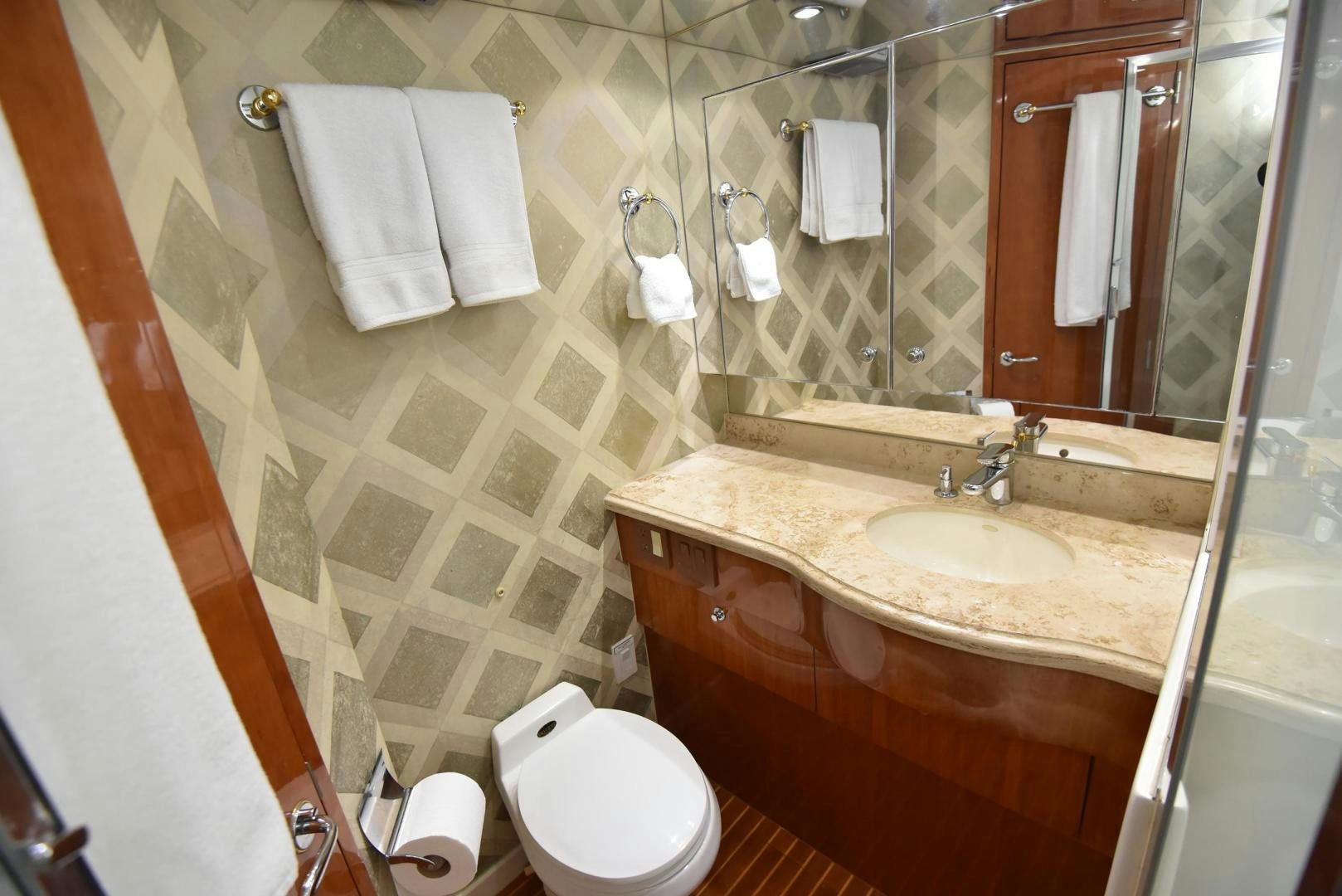 a bathroom with a sink and toilet aboard SALSA Yacht for Sale