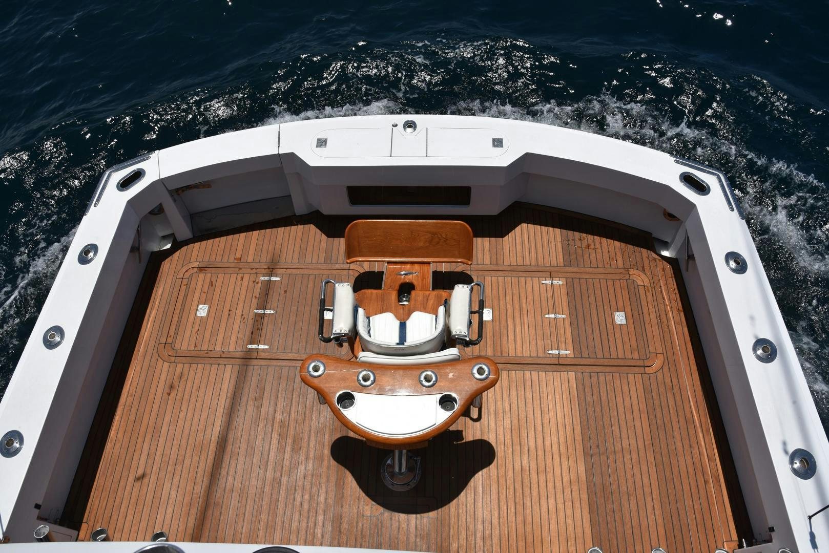 a wooden boat on a deck aboard SALSA Yacht for Sale