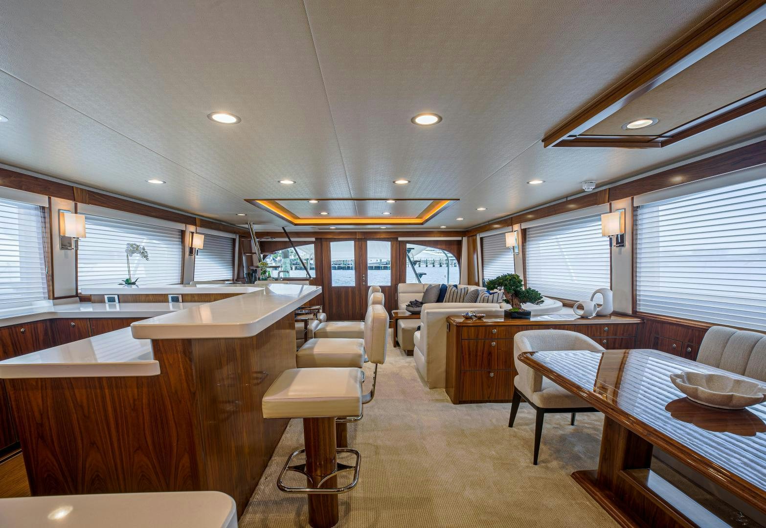a large kitchen with a dining table aboard SPECULATOR Yacht for Sale