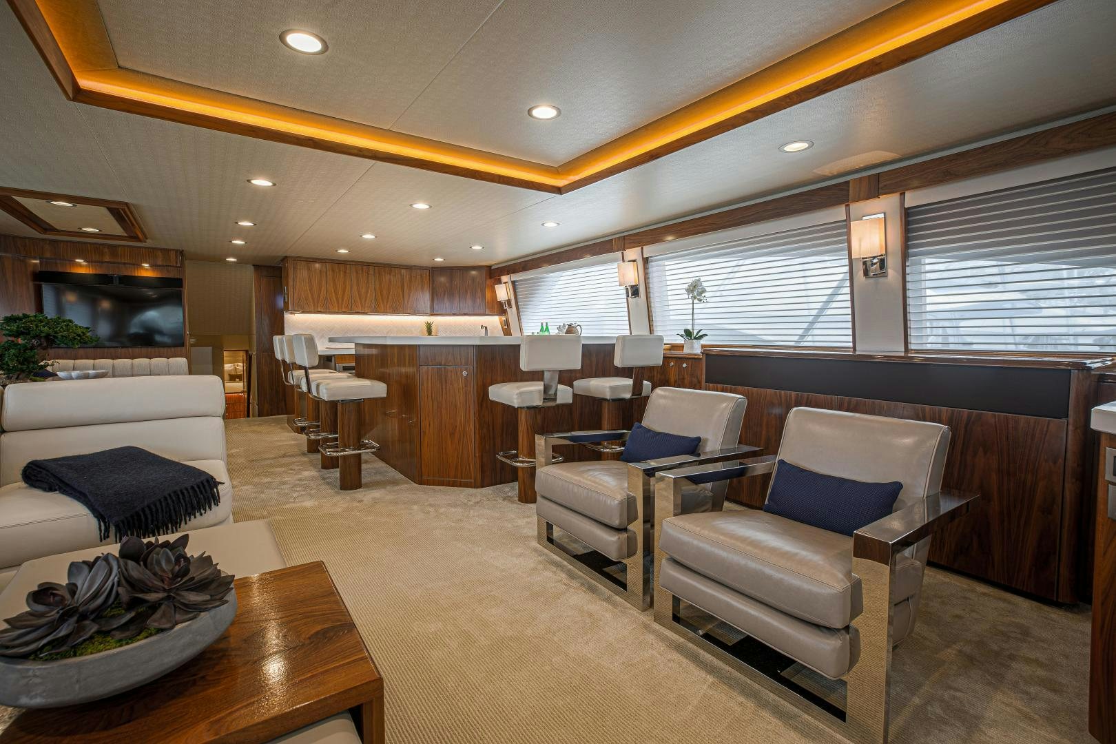 a living room with a large window aboard SPECULATOR Yacht for Sale