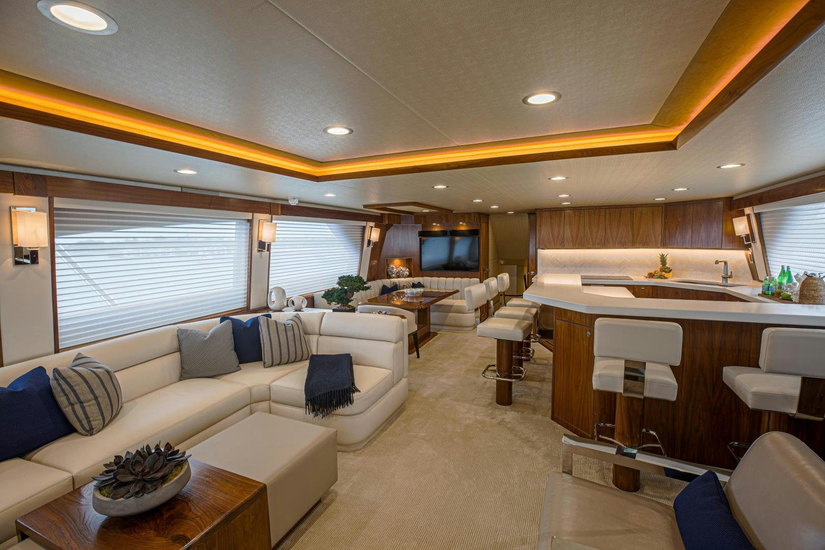 a living room with a couch and a table aboard SPECULATOR Yacht for Sale