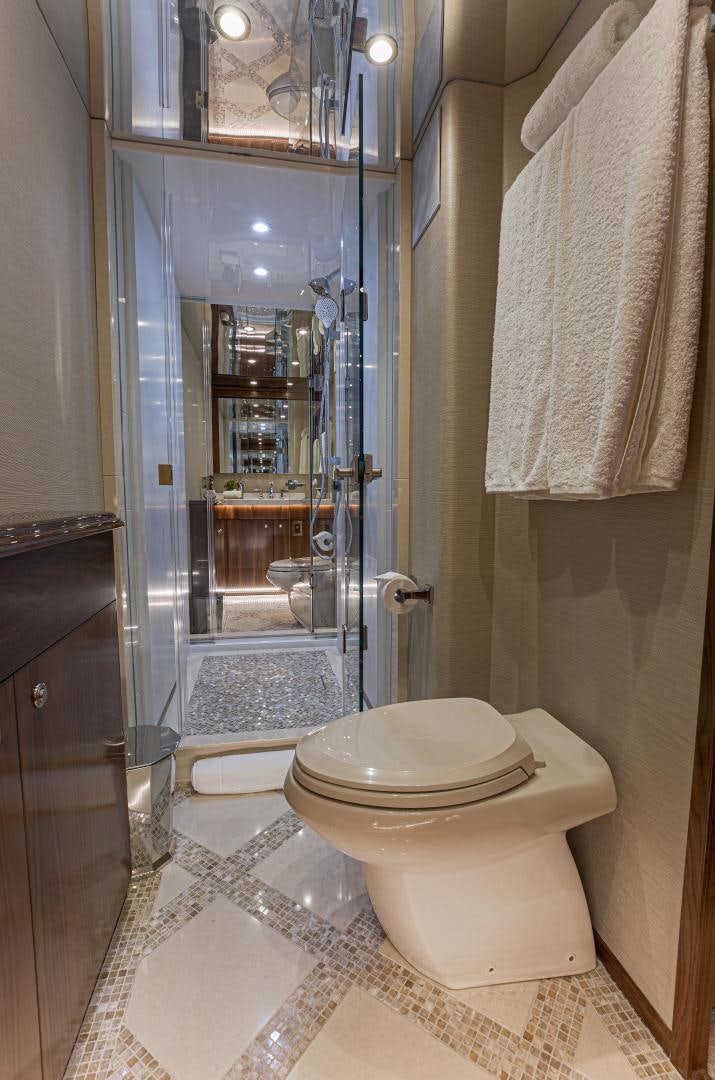 a bathroom with a glass shower aboard SPECULATOR Yacht for Sale