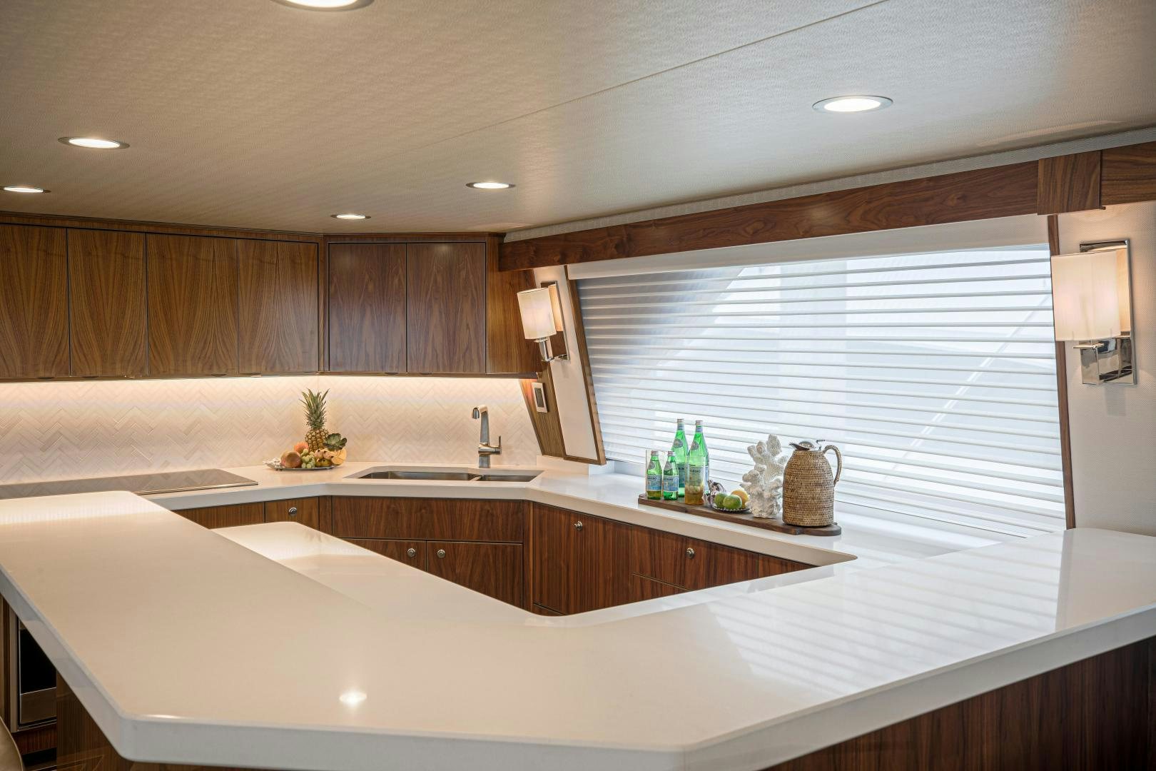a kitchen with a large window aboard SPECULATOR Yacht for Sale