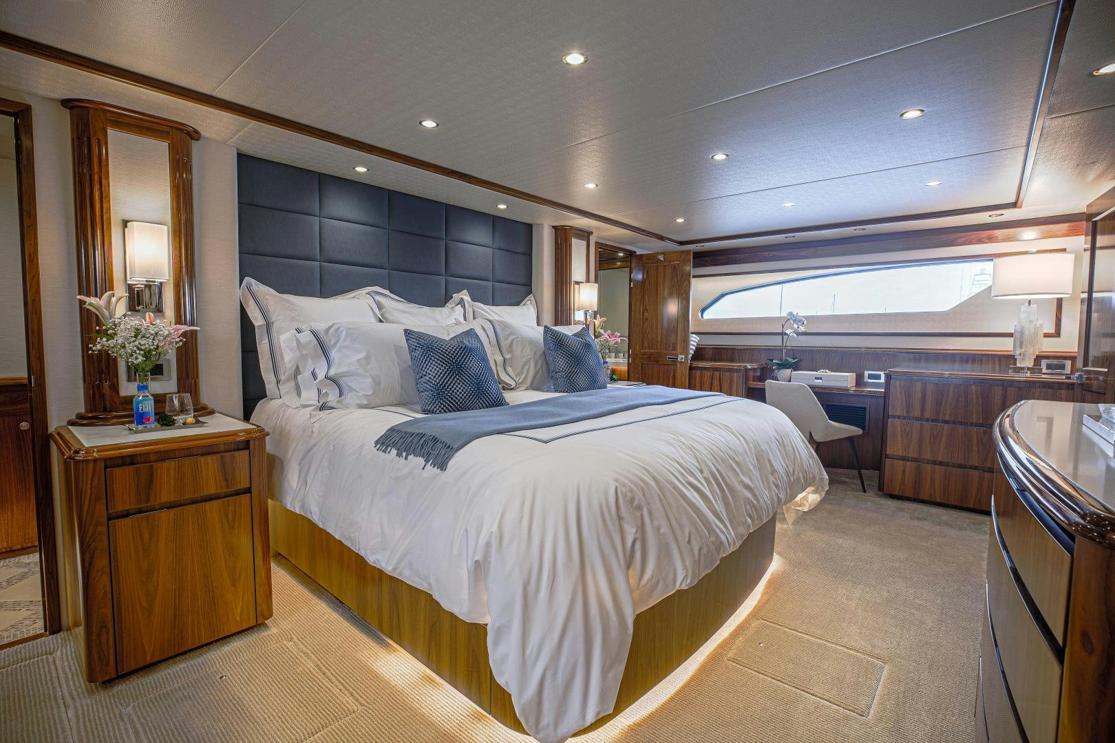 a bedroom with a large bed aboard SPECULATOR Yacht for Sale