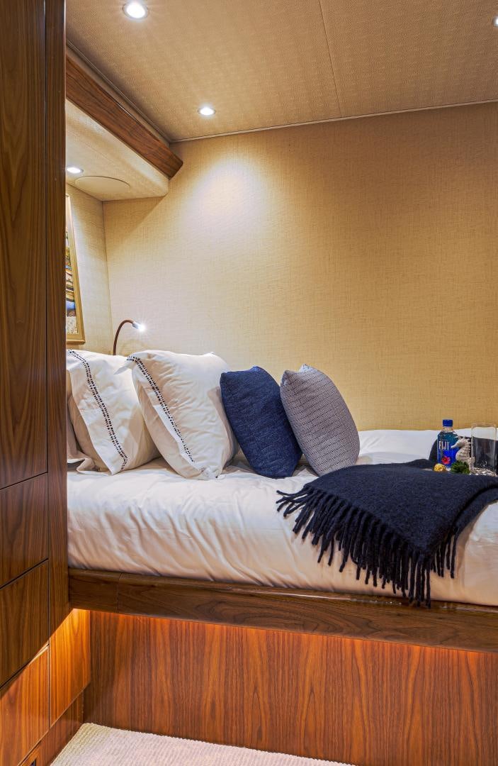 a bed with pillows aboard SPECULATOR Yacht for Sale