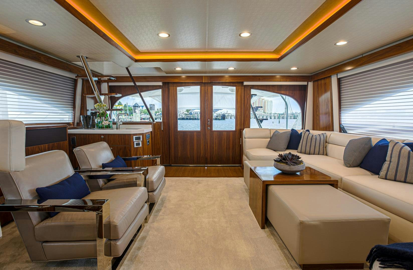 a living room with a large open door aboard SPECULATOR Yacht for Sale