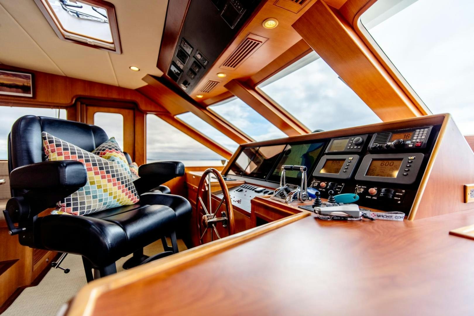 a room with a couch and a computer aboard HONORE Yacht for Sale